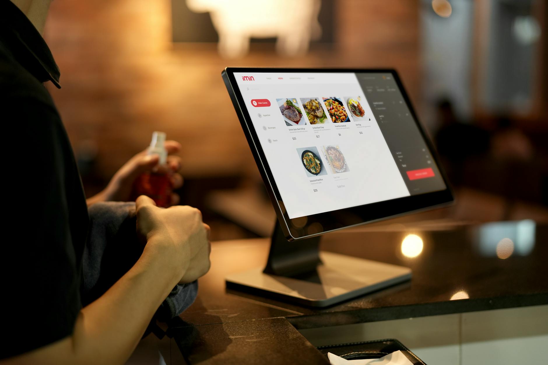 Self-service digital ordering screen at a restaurant counter